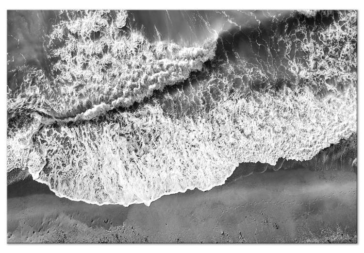 Tableau sur toile Rivage de l'océan - une photo des vagues se brisant contre la plage
