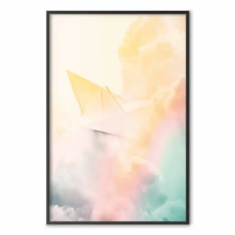 Origami - navire en papier dans les nuages colorés
