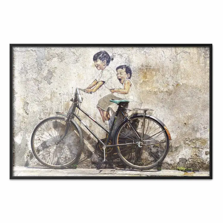 Insouciance - vélo noir rétro sur un mur peint d'enfants