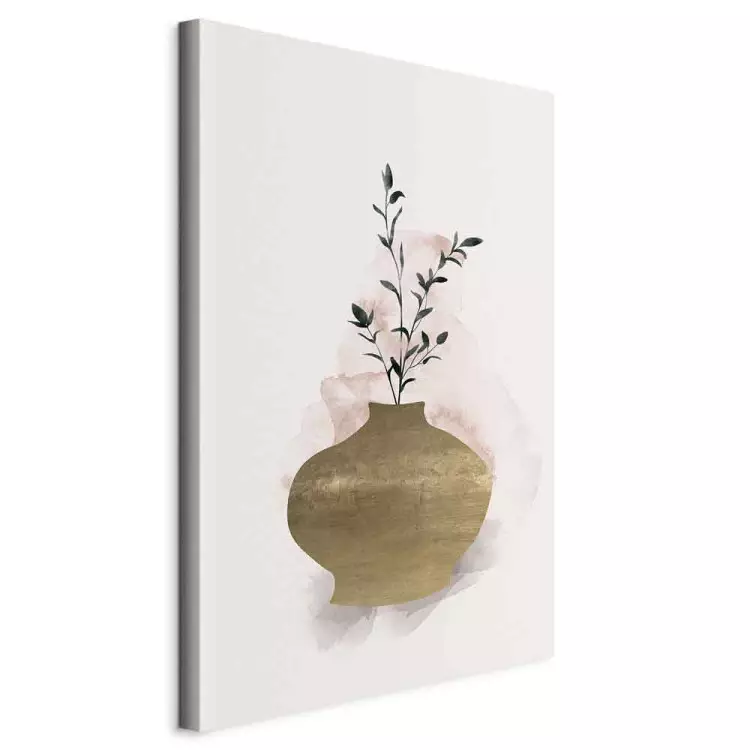 Vase marron avec une branche verte de style scandi bohème