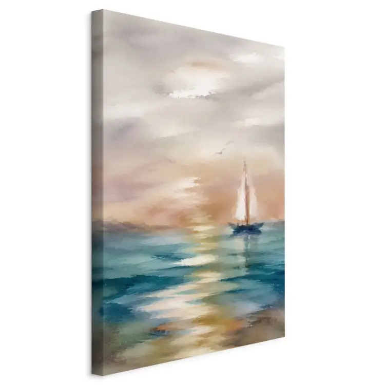 Un voilier solitaire - un coucher de soleil pittoresque sur une mer calme