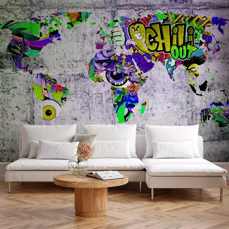 Monde du graffiti - carte colorée du monde sur fond en béton