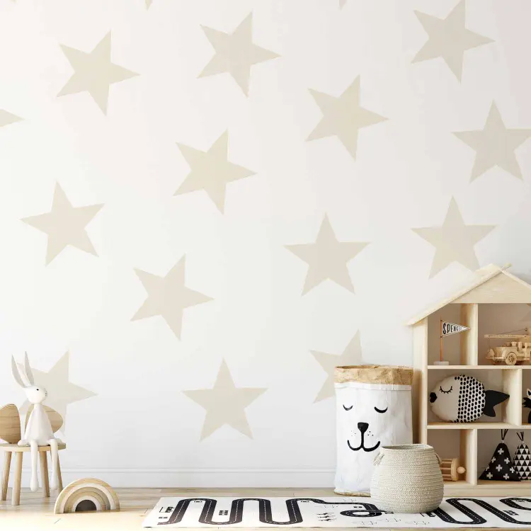 Motif d'étoiles - petites étoiles uniformes beiges sur fond blanc