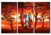 Toile murale Balade en famille - une famille africaine sur fond de soleil couchant 49252