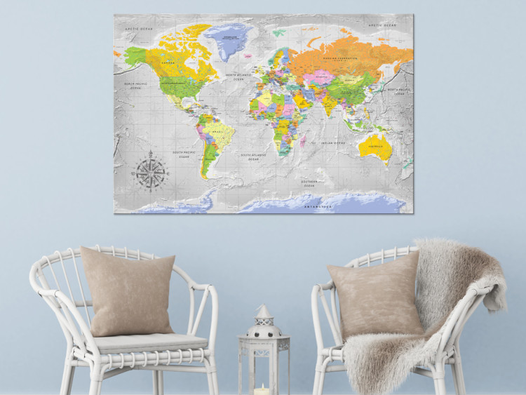 Décorer un mur avec ses photos de voyage sur une carte du monde